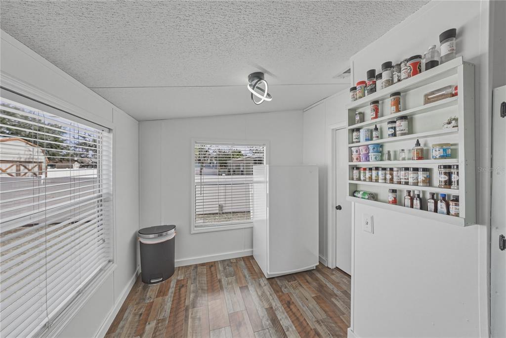 4695 Turner Road Mulberry, FL 33860 - Photo 21 of 51 a view of room with window and wooden floor