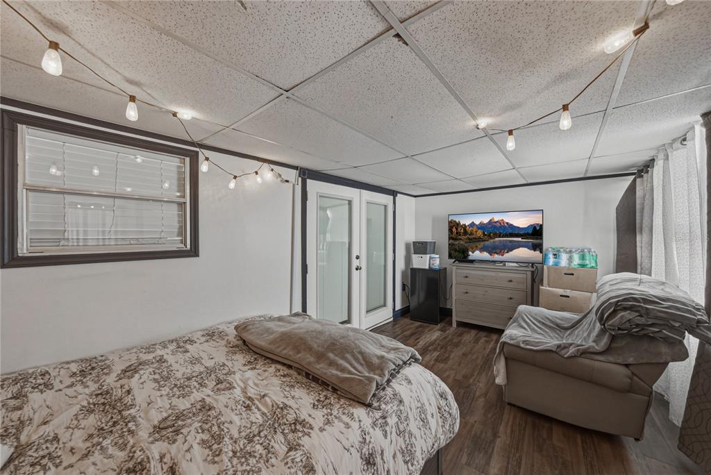 4695 Turner Road Mulberry, FL 33860 - Photo 25 of 51 a bedroom with bed couch and window