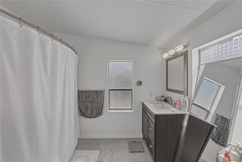 4695 Turner Road Mulberry, FL 33860 - Photo 30 of 51 a bathroom with shower