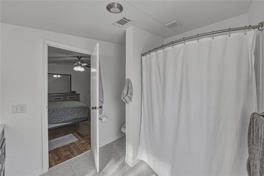 4695 Turner Road Mulberry, FL 33860 - Photo 32 of 51 a bathroom with a shower and a sink