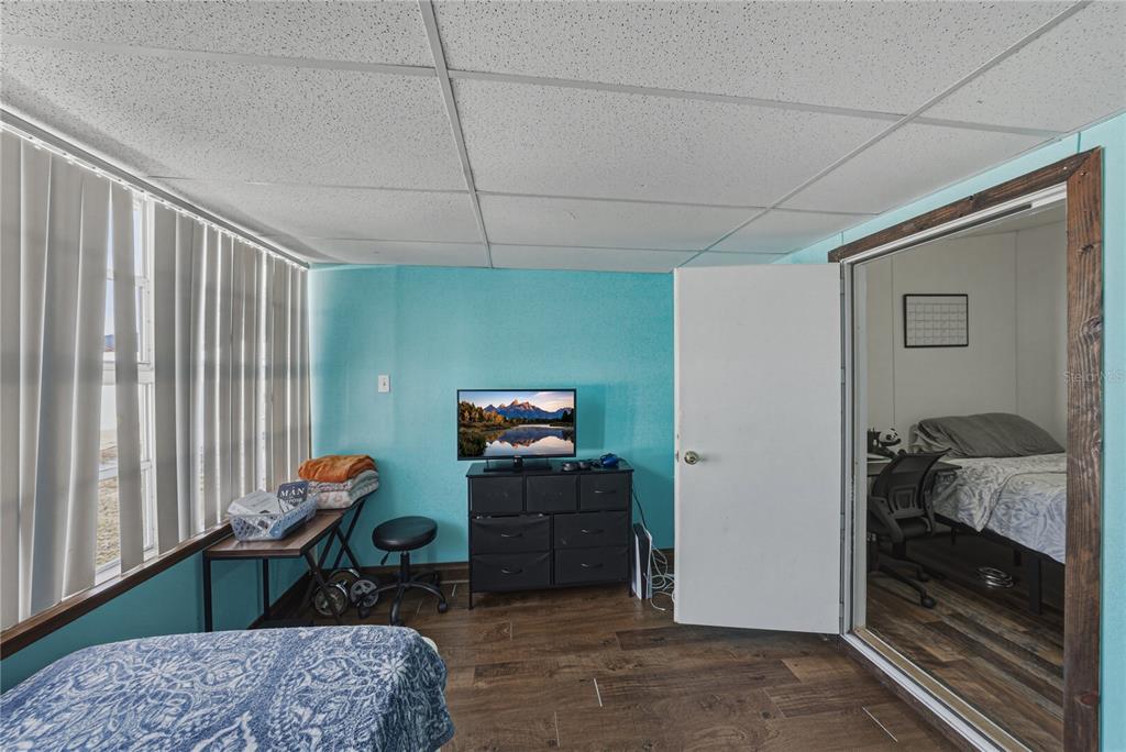 4695 Turner Road Mulberry, FL 33860 - Photo 41 of 51 a bedroom with furniture and a rug