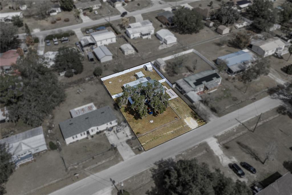 4695 Turner Road Mulberry, FL 33860 - Photo 50 of 51 an aerial view of a house with a yard