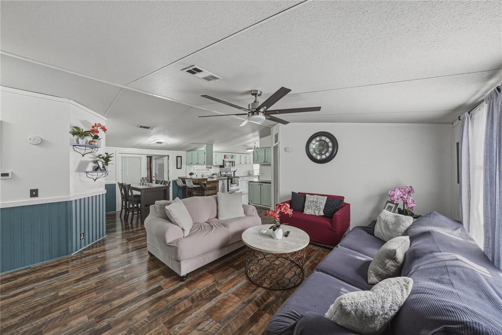4695 Turner Road Mulberry, FL 33860 - Photo 10 of 51 a living room with furniture and wooden floor