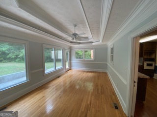 1117 Boss Hardy Road Auburn, GA 30011 - Photo 6 of 19 a view of hallway with furniture and wooden floor