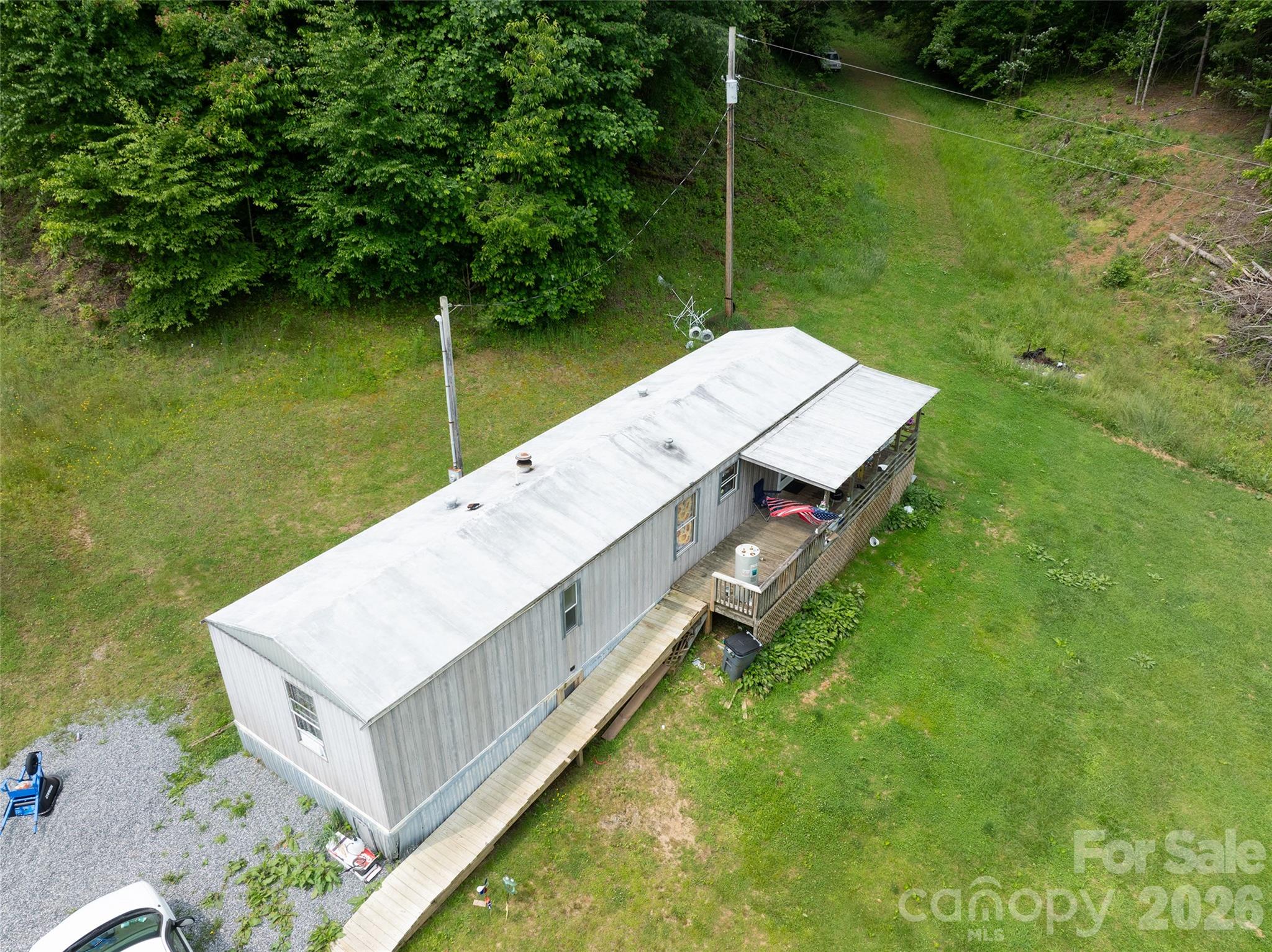 320 Board Tree Road Marshall, NC 28753 - Photo 6 of 13 a aerial view of a house with pool and a yard
