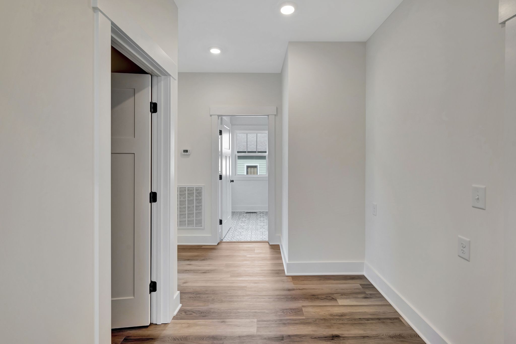 1038 Camden Trail Greenbrier, TN 37073 - Photo 16 of 36 a view of a hallway with wooden floor