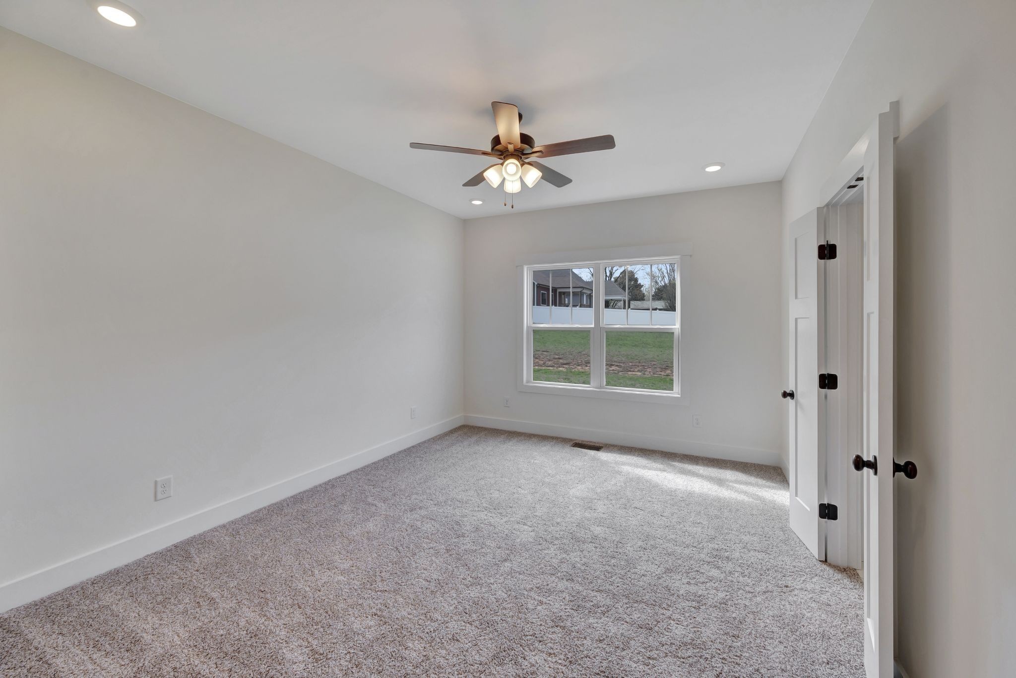 1038 Camden Trail Greenbrier, TN 37073 - Photo 18 of 36 a view of an empty room with a window