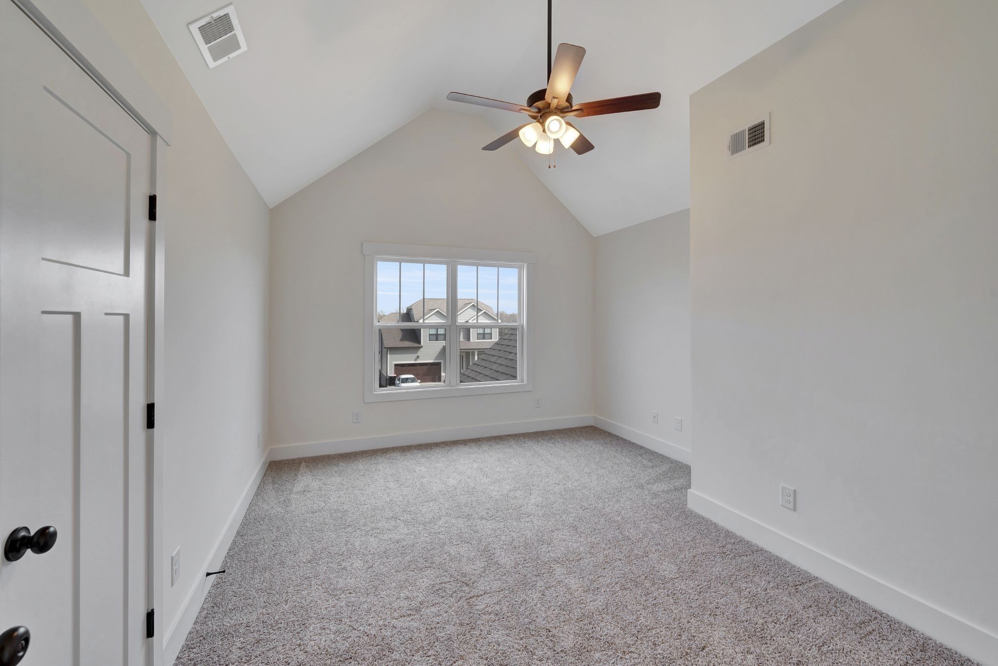 1038 Camden Trail Greenbrier, TN 37073 - Photo 27 of 36 an empty room with windows and chandelier fan