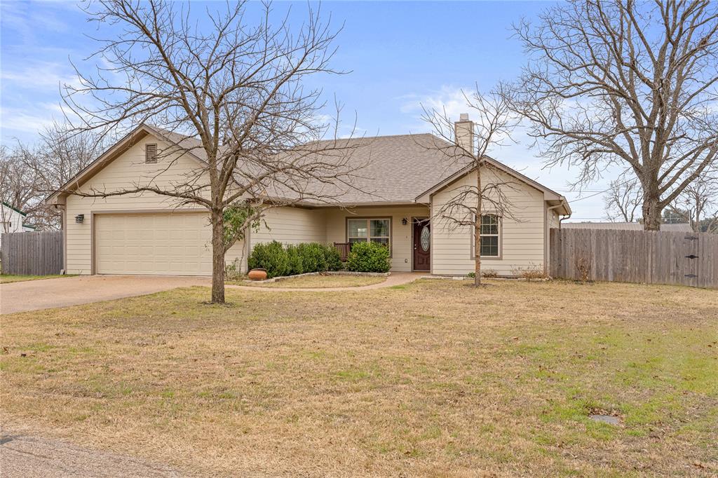 10514 Mesa Drive Waco, TX 76708 - Photo 1 of 37 View of front facade with driveway, covered porch, a chimney, and a garage