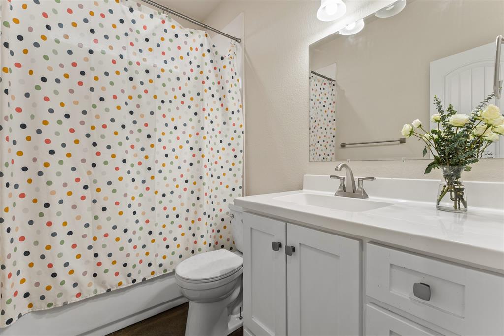 10514 Mesa Drive Waco, TX 76708 - Photo 21 of 37 Bathroom with vanity and shower / tub combo