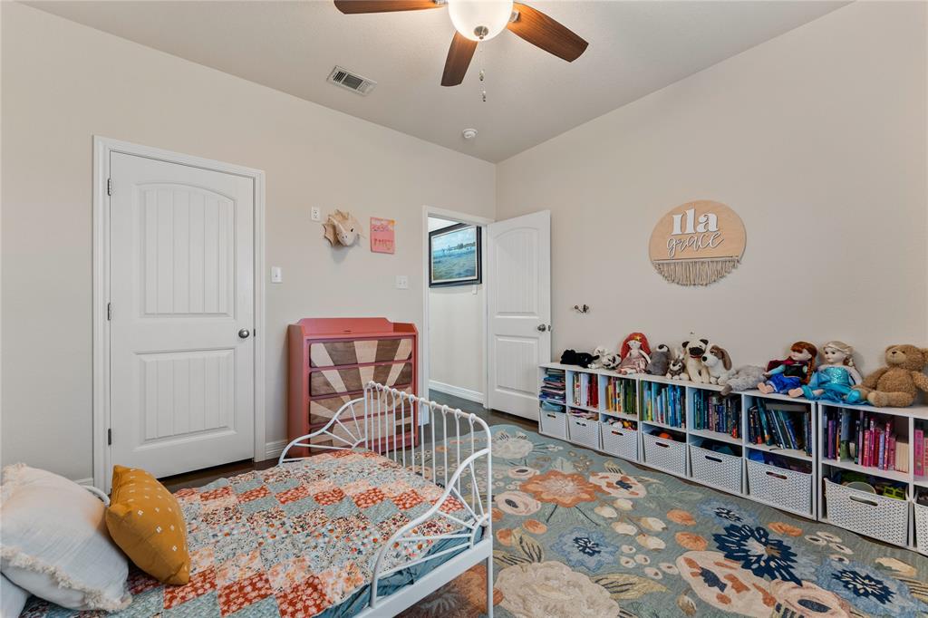 10514 Mesa Drive Waco, TX 76708 - Photo 24 of 39 Bedroom featuring ceiling fan