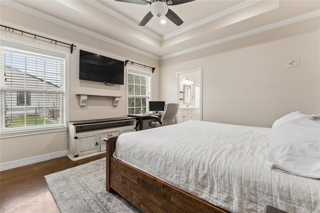 10514 Mesa Drive Waco, TX 76708 - Photo 27 of 39 Bedroom featuring concrete flooring, ceiling fan, crown molding, connected bathroom, and recessed lighting