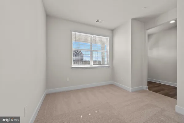 a view of kitchen with wooden floor