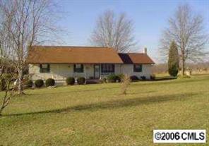 2204 George Brown Road Crouse, NC 28033 - Photo 2 of 8 a front view of a house with a yard
