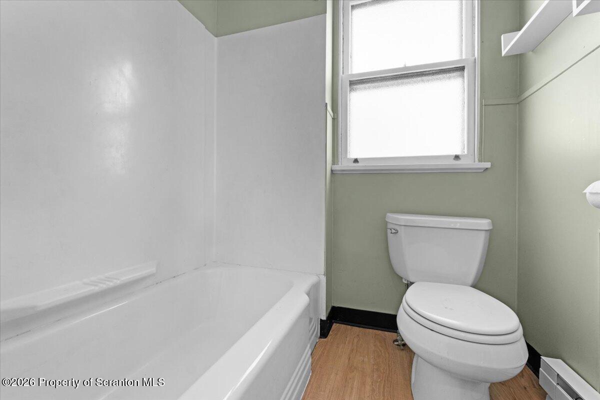 715 Alder Street Scranton, PA 18505 - Photo 20 of 38 a bathroom with a toilet sink and bathtub