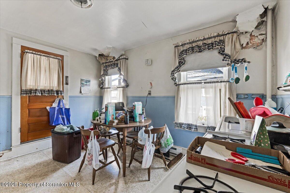715 Alder Street Scranton, PA 18505 - Photo 27 of 38 a view of a workspace with furniture and a window