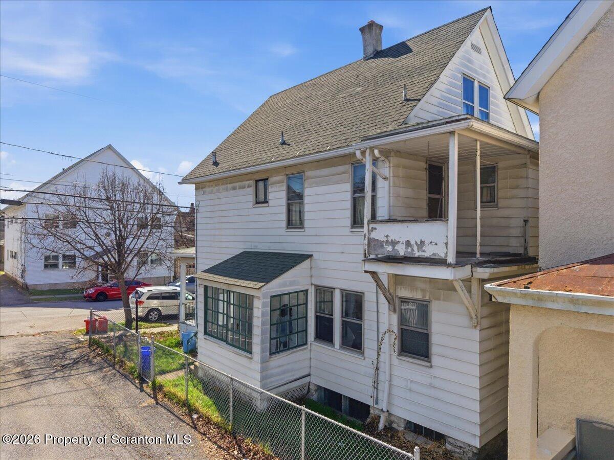 715 Alder Street Scranton, PA 18505 - Photo 3 of 38 a view of a house with a yard