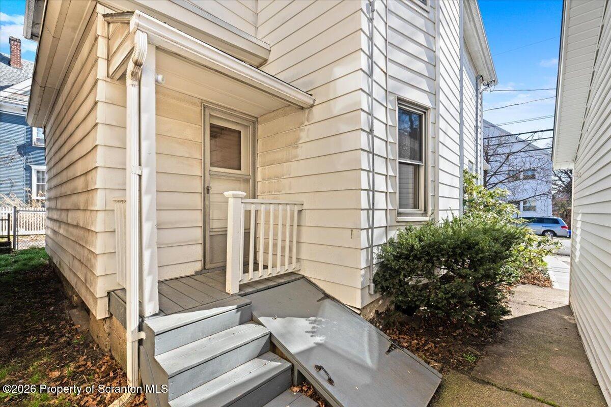 715 Alder Street Scranton, PA 18505 - Photo 33 of 38 front view of a house with a potted plant