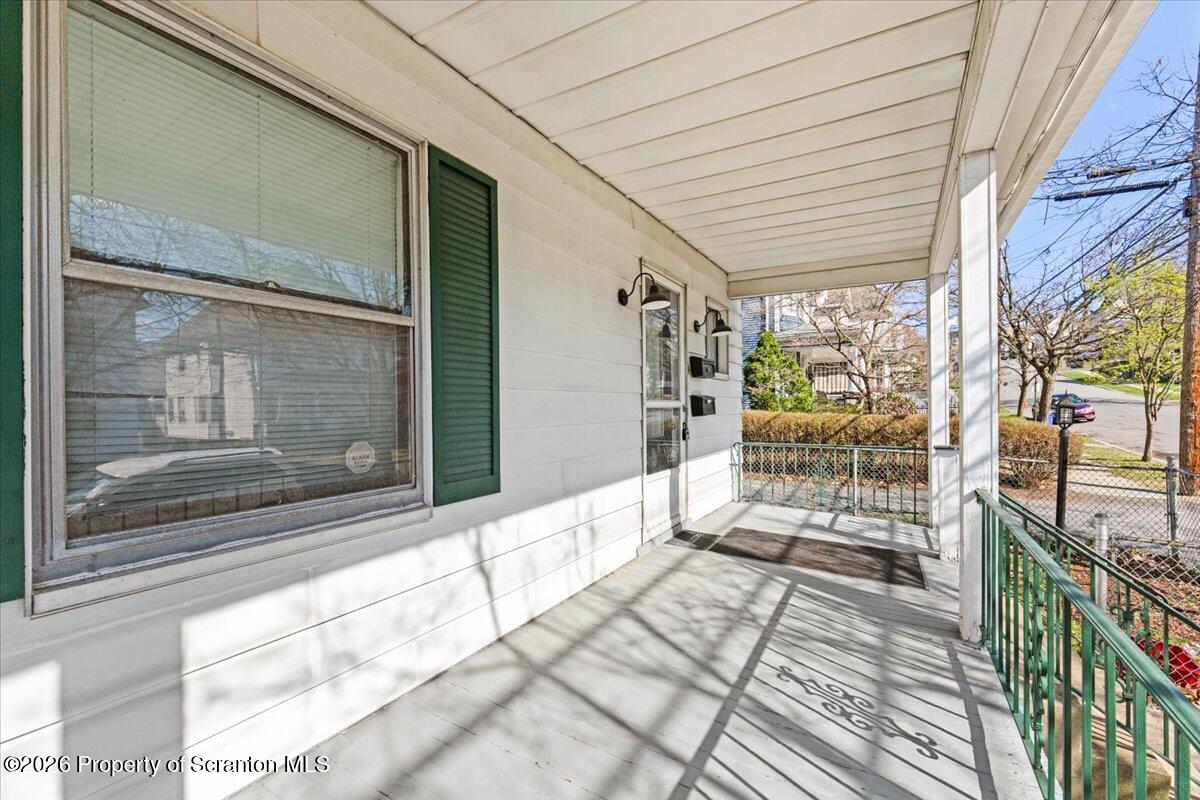 715 Alder Street Scranton, PA 18505 - Photo 34 of 38 a view of a porch with wooden floor