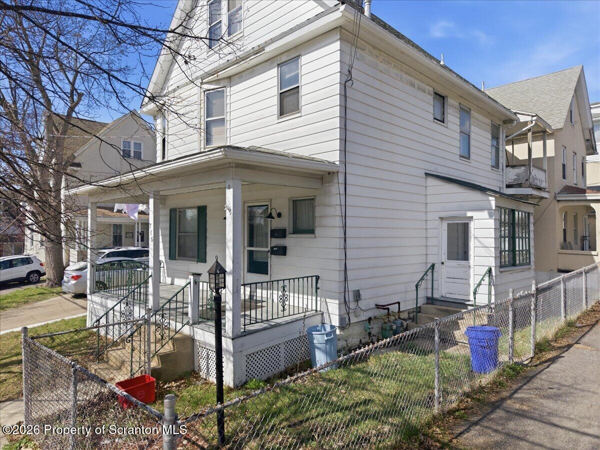 715 Alder Street Scranton, PA 18505 - Photo 4 of 38 a view of a house with backyard and sitting area