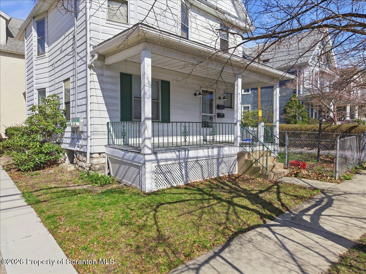 715 Alder Street Scranton, PA 18505 - Photo 5 of 38 a view of a house with backyard and sitting area