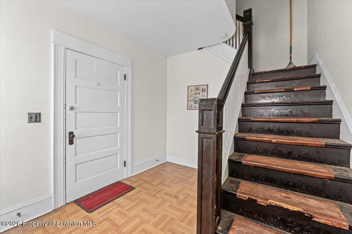 715 Alder Street Scranton, PA 18505 - Photo 10 of 38 a bedroom with bed and a window