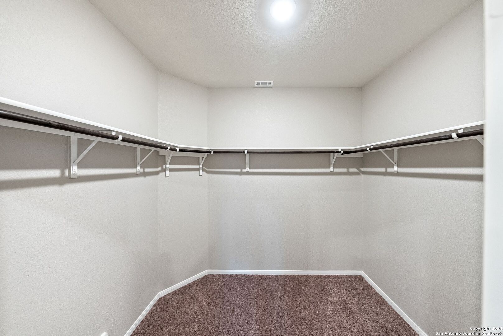 10535 Margarita Loop Converse, TX 78109 - Photo 26 of 51 a view of a room with racks on the wall