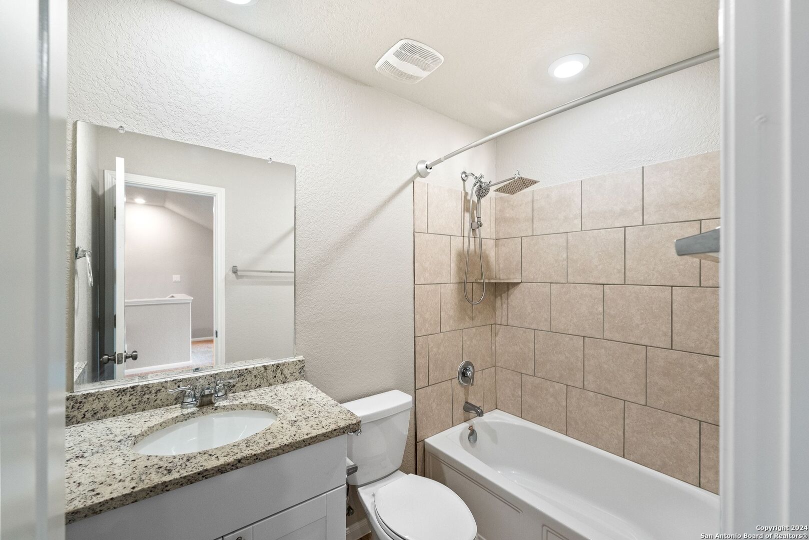 10535 Margarita Loop Converse, TX 78109 - Photo 33 of 51 a bathroom with a granite countertop sink toilet and shower