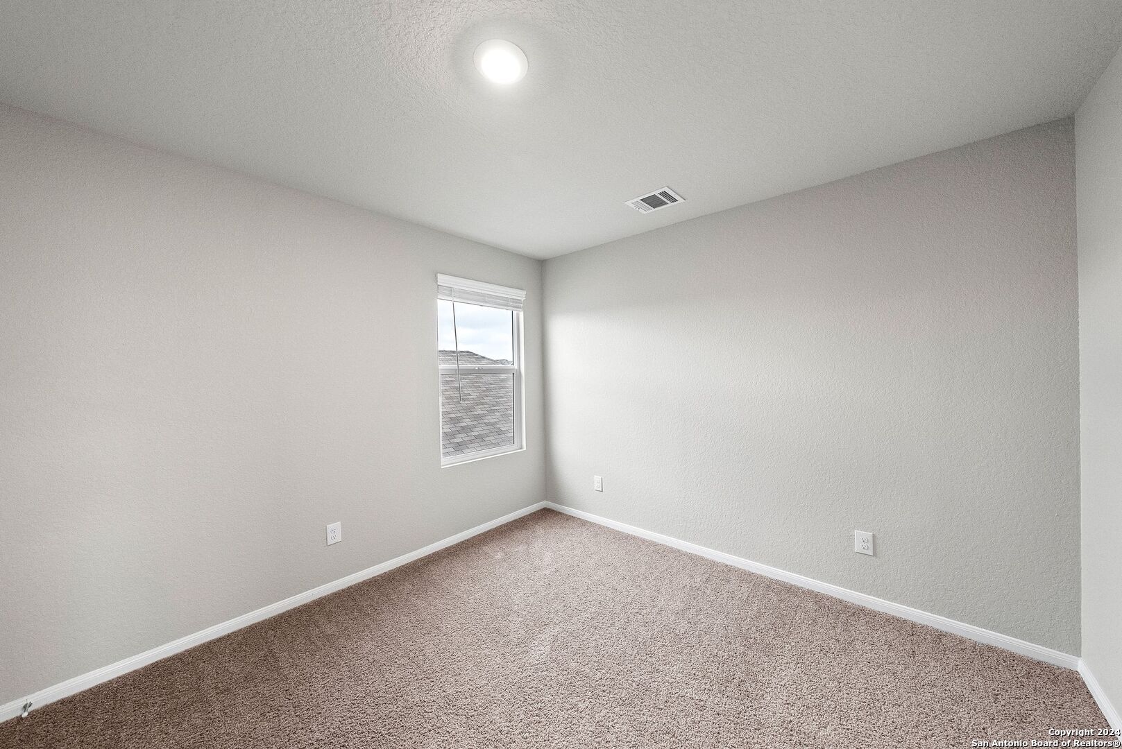 10535 Margarita Loop Converse, TX 78109 - Photo 36 of 51 an empty room with windows