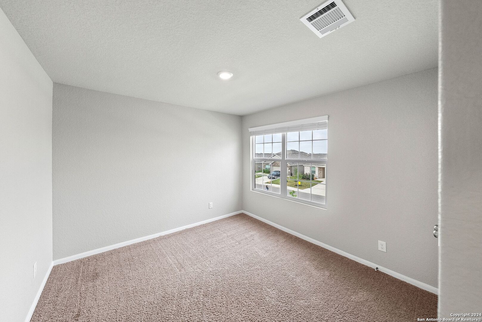 10535 Margarita Loop Converse, TX 78109 - Photo 40 of 51 an empty room with windows