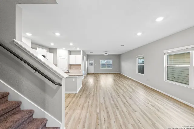 a view of a living room and dining room