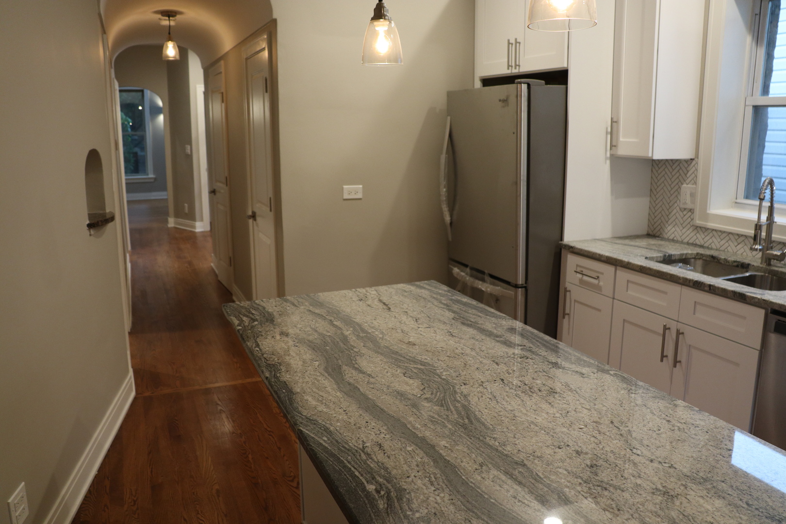 1307 West Fillmore Street Chicago, IL 60607 - Photo 12 of 42 a bathroom with a sink and a shower
