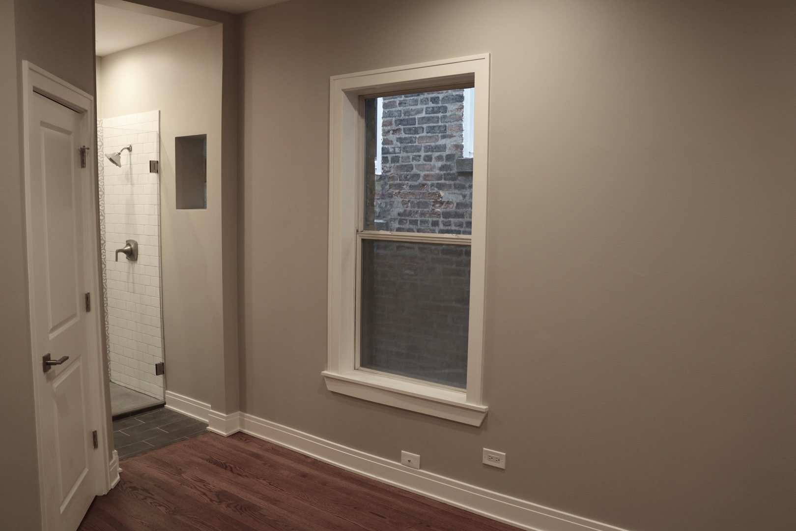 1307 West Fillmore Street Chicago, IL 60607 - Photo 13 of 42 a view of an empty room with closet and a window
