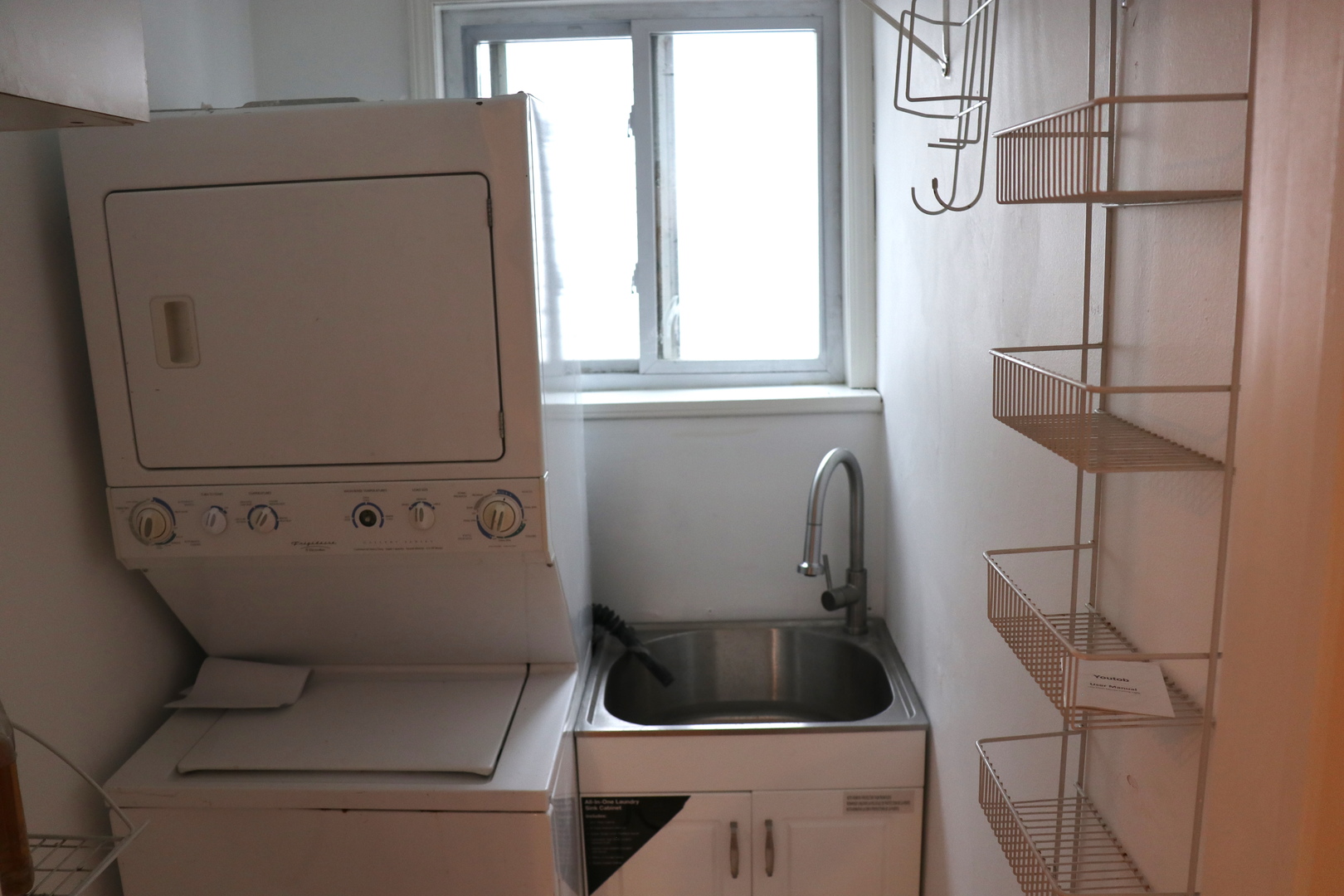1307 West Fillmore Street Chicago, IL 60607 - Photo 16 of 42 a bathroom with a sink a toilet and a window