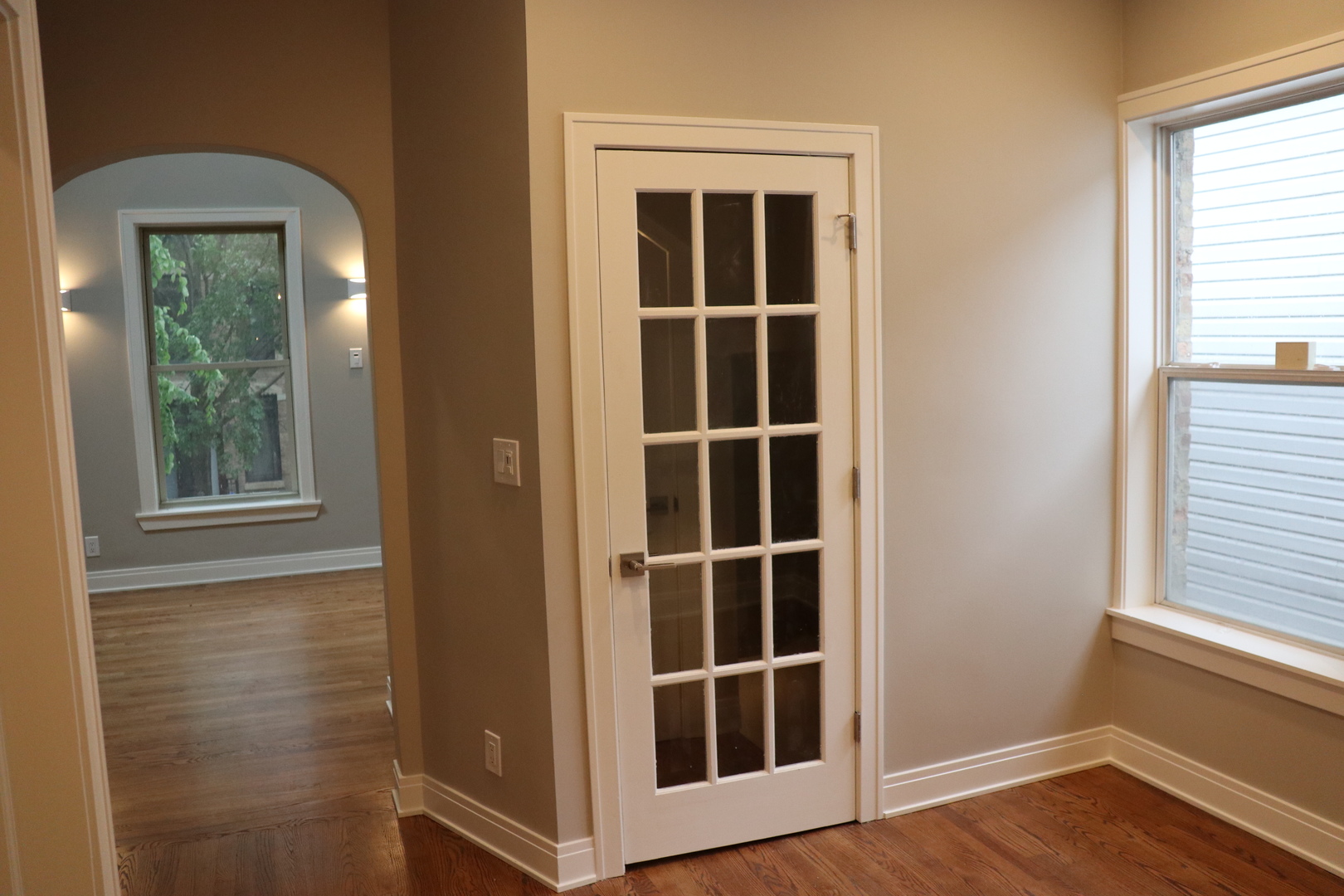 1307 West Fillmore Street Chicago, IL 60607 - Photo 19 of 42 a view of empty room with windows and entryway
