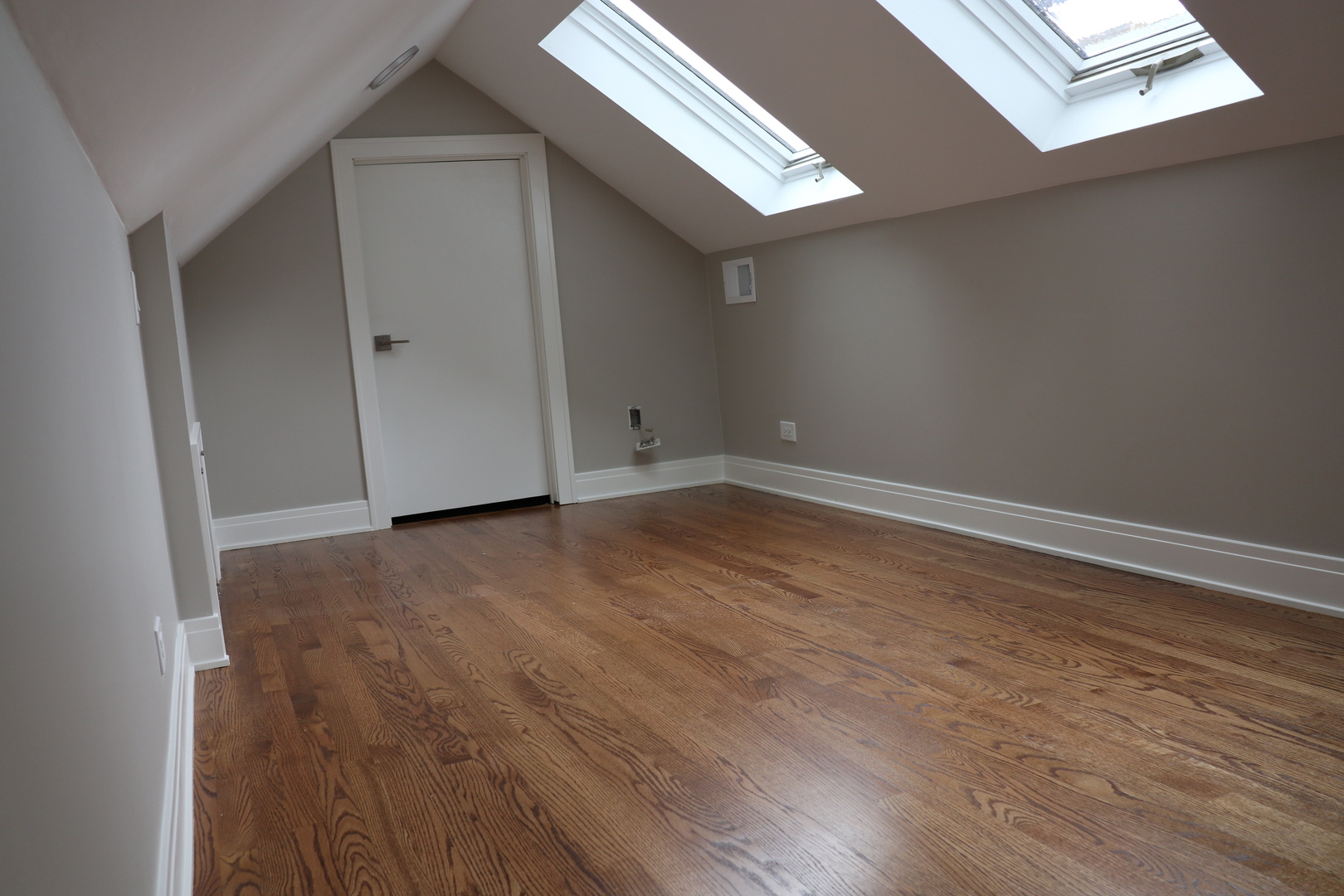1307 West Fillmore Street Chicago, IL 60607 - Photo 24 of 42 an empty room with wooden floor