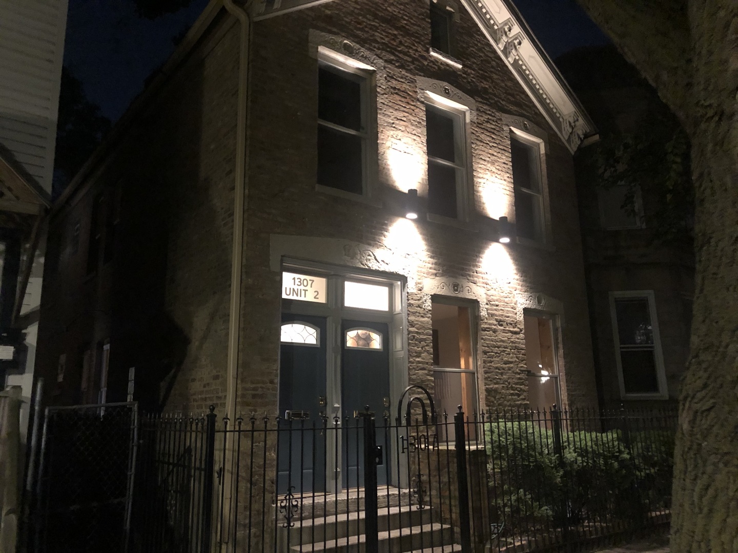 1307 West Fillmore Street Chicago, IL 60607 - Photo 3 of 42 a view of a house with a pathway