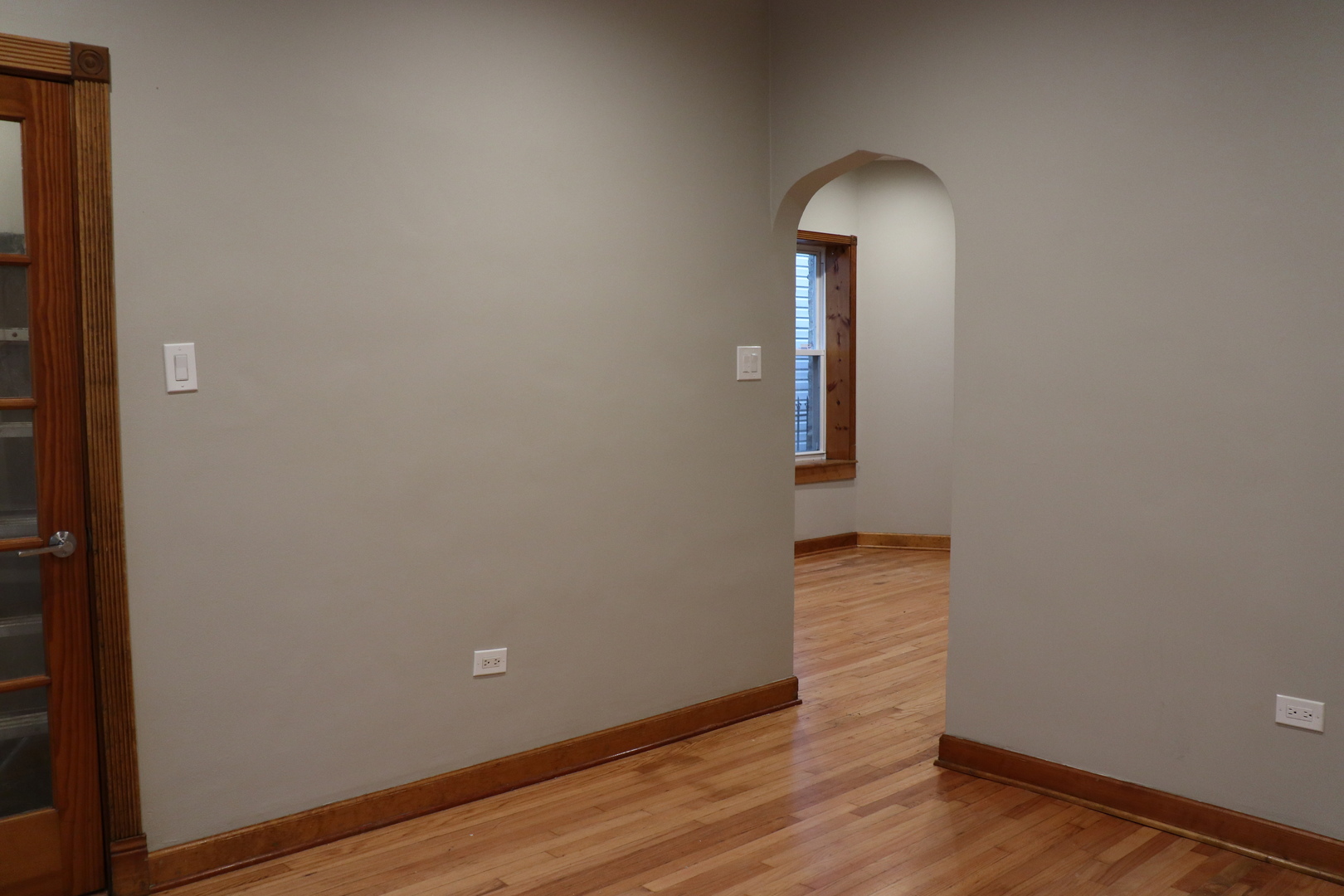 1307 West Fillmore Street Chicago, IL 60607 - Photo 10 of 42 a view of a room with wooden floor and mirror