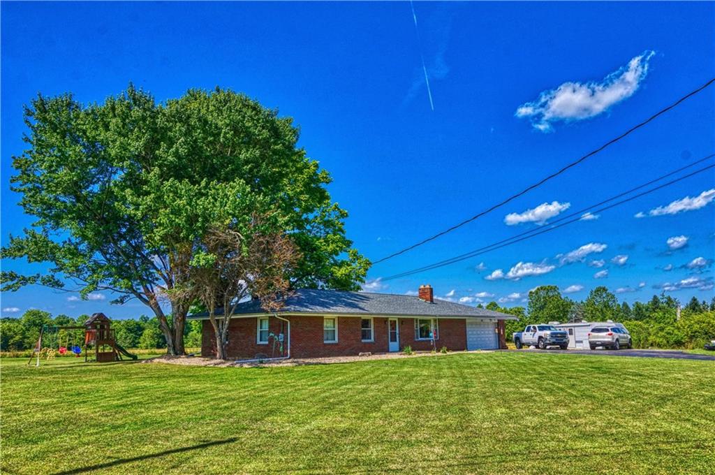513 Mercer Road Slippery Rock, PA 16057 - Photo 2 of 25 Situated on nearly an acre tabletop lot surrounded by fields yet conveniently located.