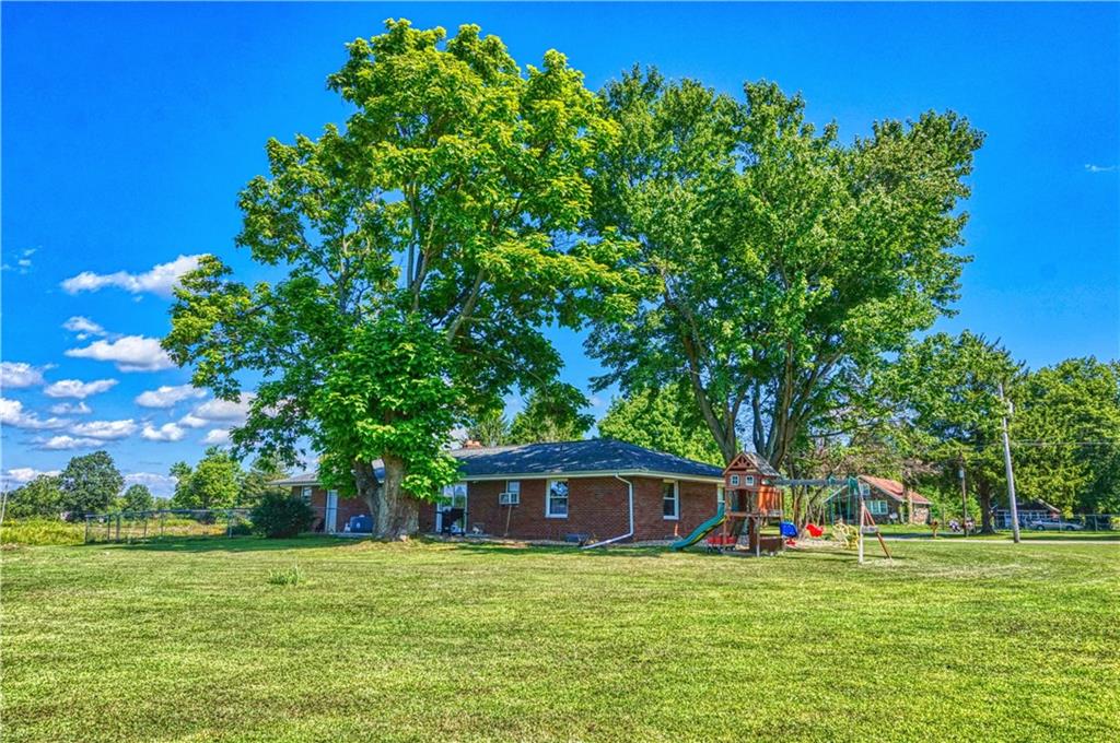 513 Mercer Road Slippery Rock, PA 16057 - Photo 3 of 25 Mature trees keep the home cool on those hot summer days! Great yard space for a ball game or playset!