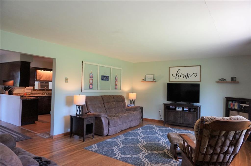 513 Mercer Road Slippery Rock, PA 16057 - Photo 6 of 25 The spacious living area offers refinished hardwood floors, plaster walls throughout and lots of natural light!