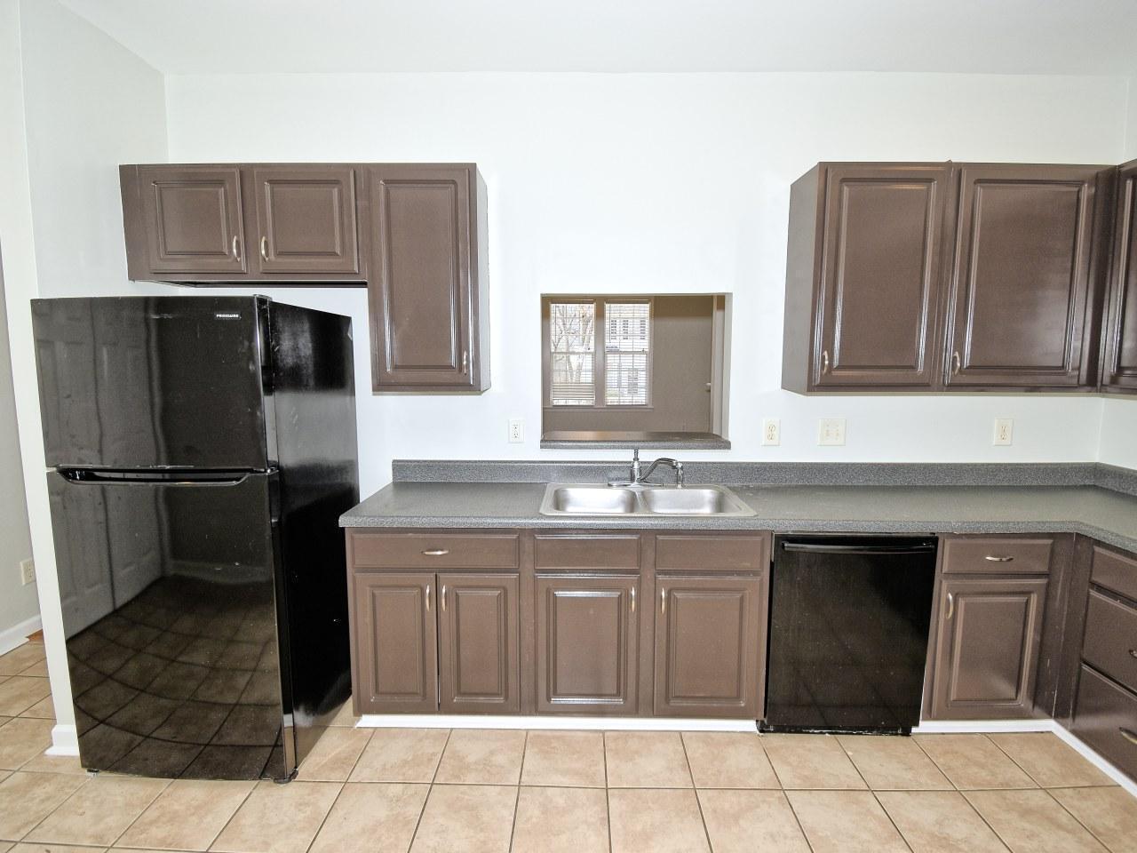 2245 Long Pine Lane Raleigh, NC 27603 - Photo 13 of 33 a kitchen with stainless steel appliances granite countertop a refrigerator and a sink