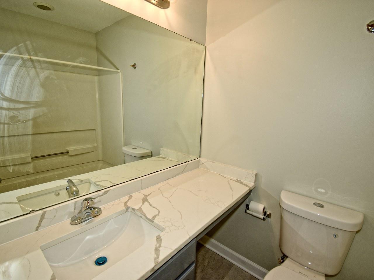 2245 Long Pine Lane Raleigh, NC 27603 - Photo 28 of 33 a bathroom with a sink and a toilet