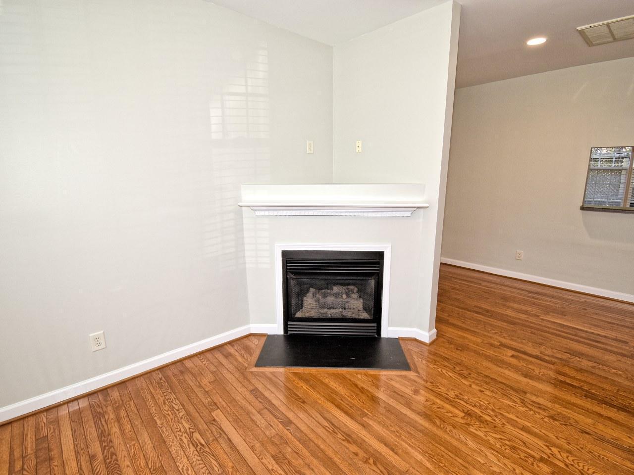 2245 Long Pine Lane Raleigh, NC 27603 - Photo 8 of 33 a room with a fireplace and a fireplace