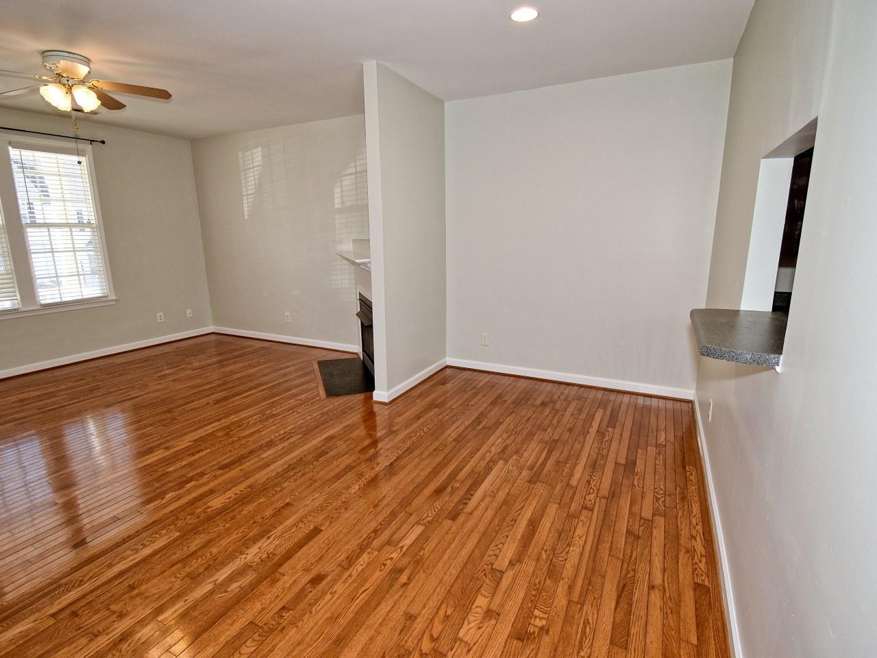 2245 Long Pine Lane Raleigh, NC 27603 - Photo 10 of 33 an empty room with wooden floor and windows