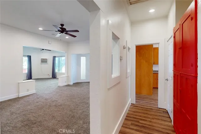 a bathroom with a tub a sink and a shower