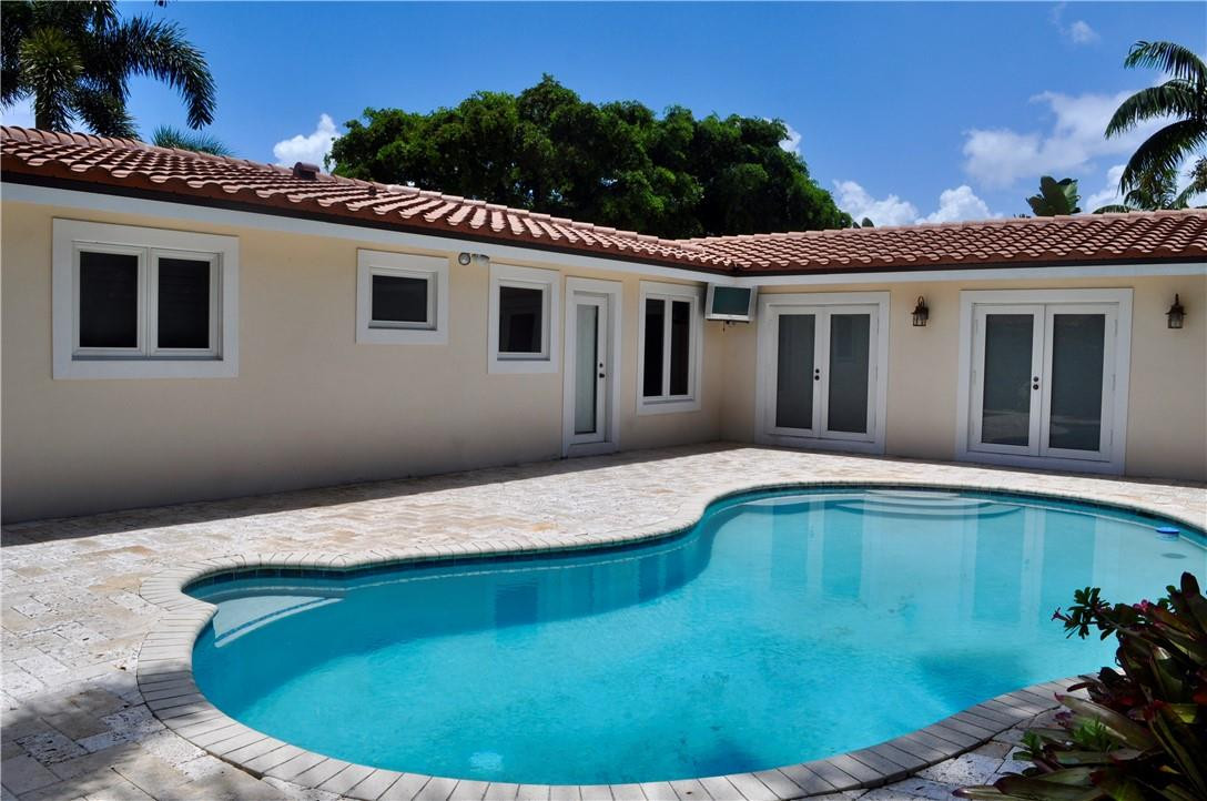 2011 Northeast 31st Court Lighthouse Point, FL 33064 - Photo 25 of 49 Love the seat in the pool!