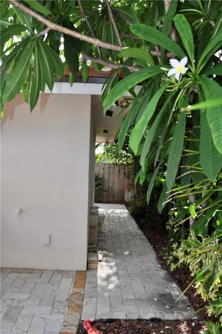 2011 Northeast 31st Court Lighthouse Point, FL 33064 - Photo 41 of 49 The pavers go behind the house.