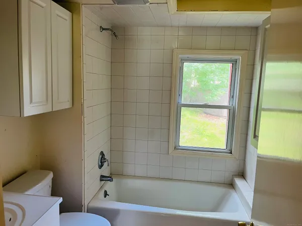 a view of a deck with a yard