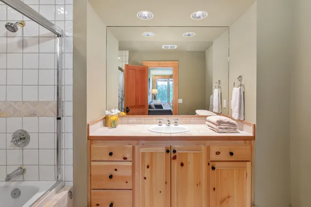 a bathroom with a sink and a vanity